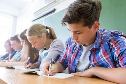 group of students takes the test in class