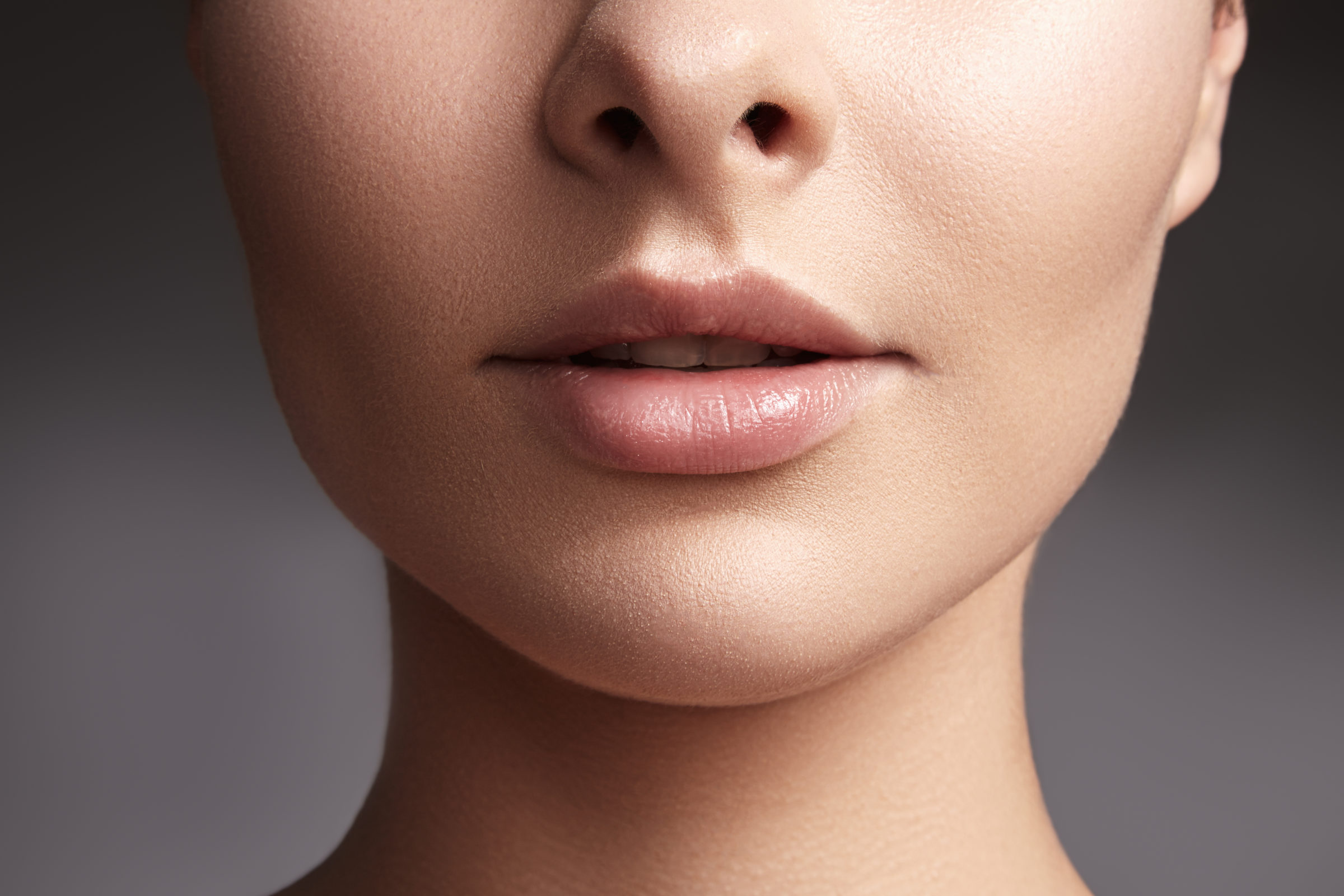 Beauty shot for spa salon. Close-up portrait beauty woman. Natural lip closep. Sexy and full lips. Clean skin