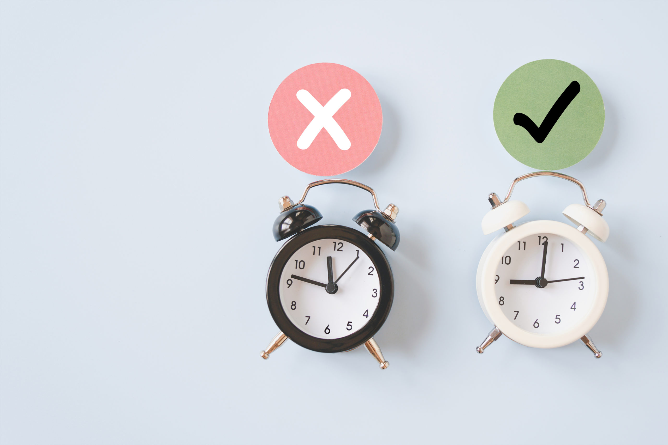black and white analog clock and true , false icon on circle paper on light blue background with copy space, time to choose or make decision