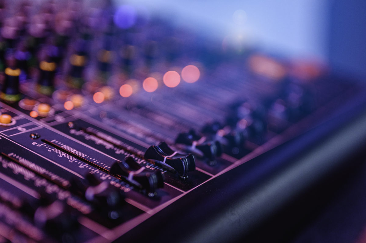 Professional audio mixing console in concert.