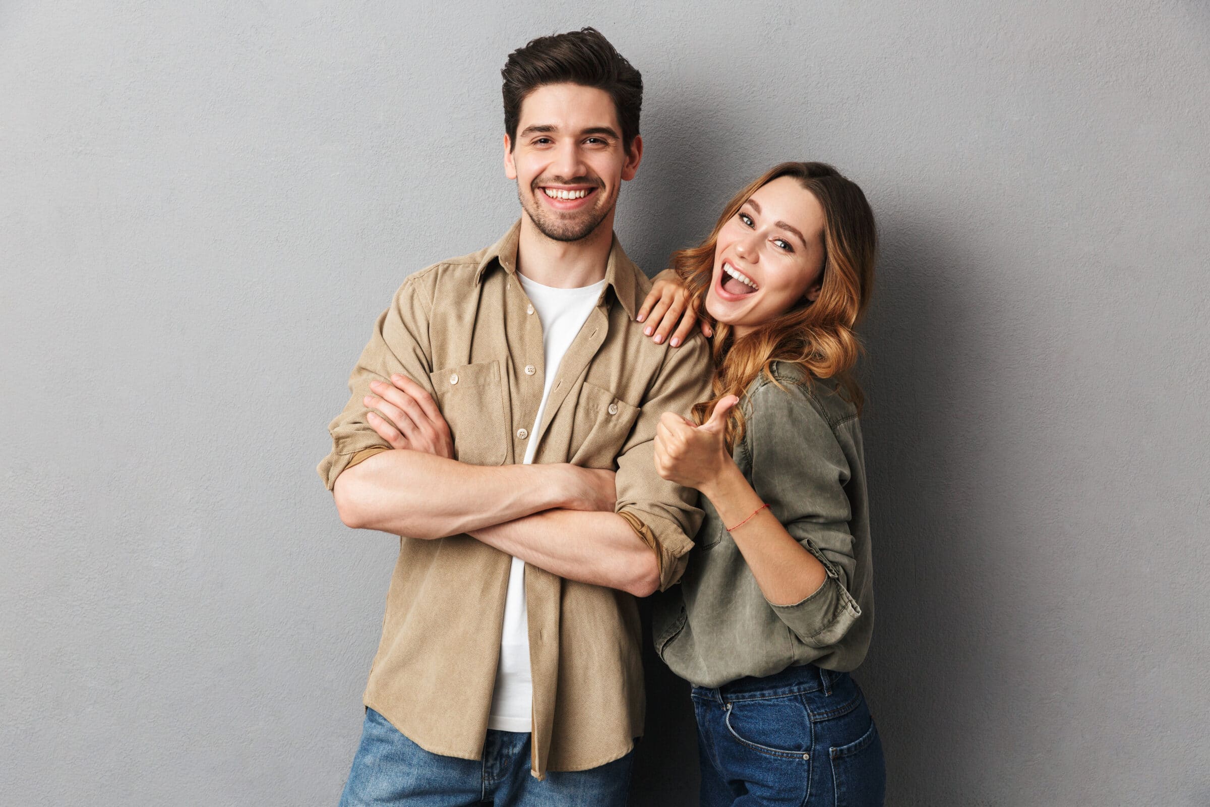 Portrait of a cheerful young couple standing together