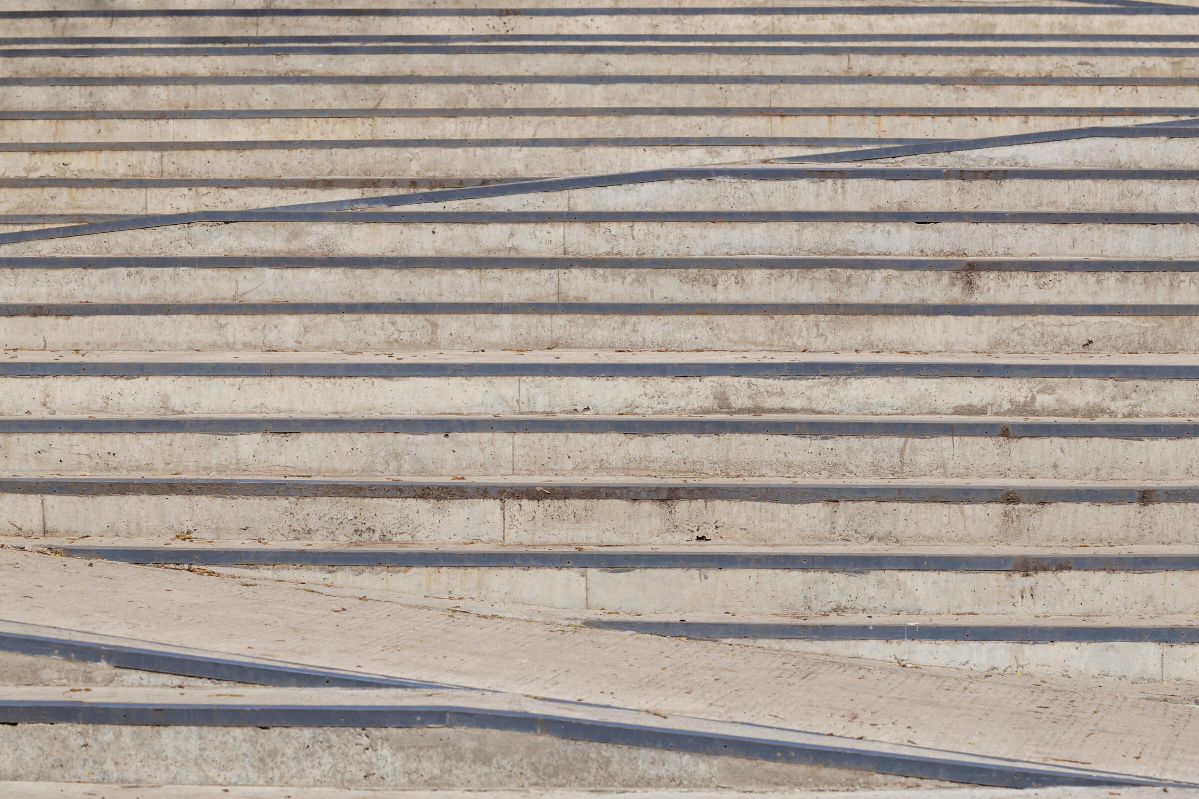 Concrete staircase with ramp accessibility